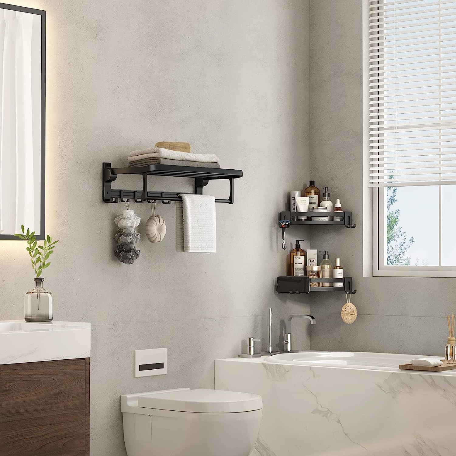 Black corner shower shelf caddy with two tiers, side hooks, and bar towel holder
