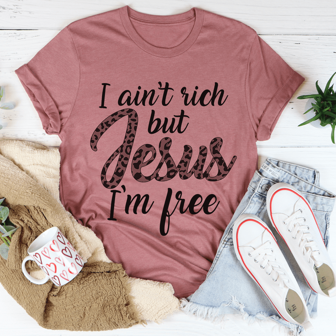 Mauve graphic T-shirt with 'I ain't rich but Jesus I'm free' slogan print