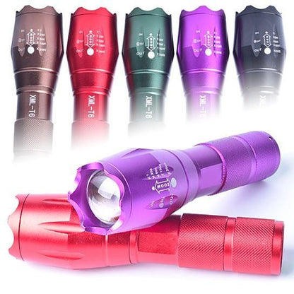 Zoomable focusing flashlight pair: purple unit in front and red unit in back, with other colors.