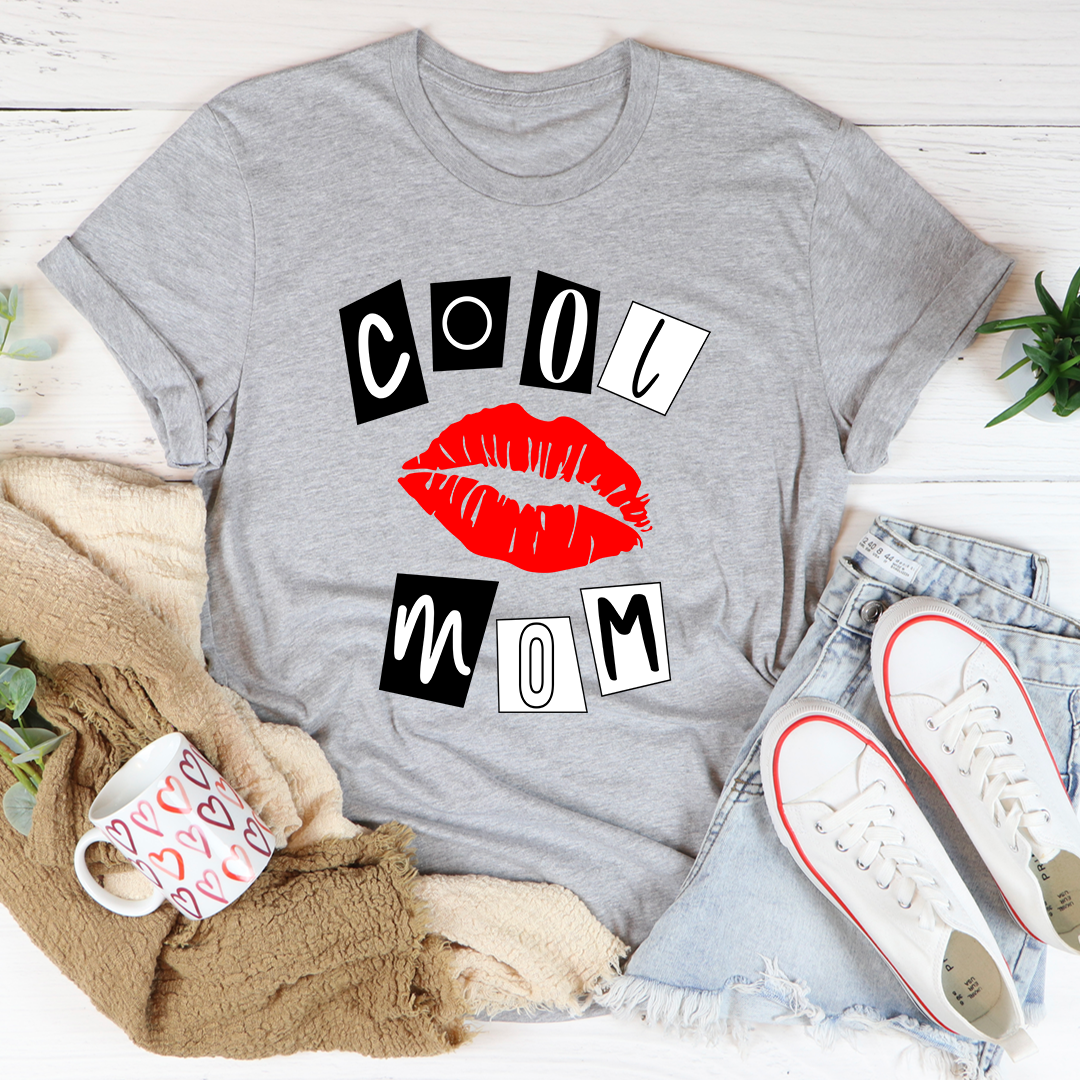 Heather grey T-shirt featuring red lips and MOM text graphic in black and white blocks
