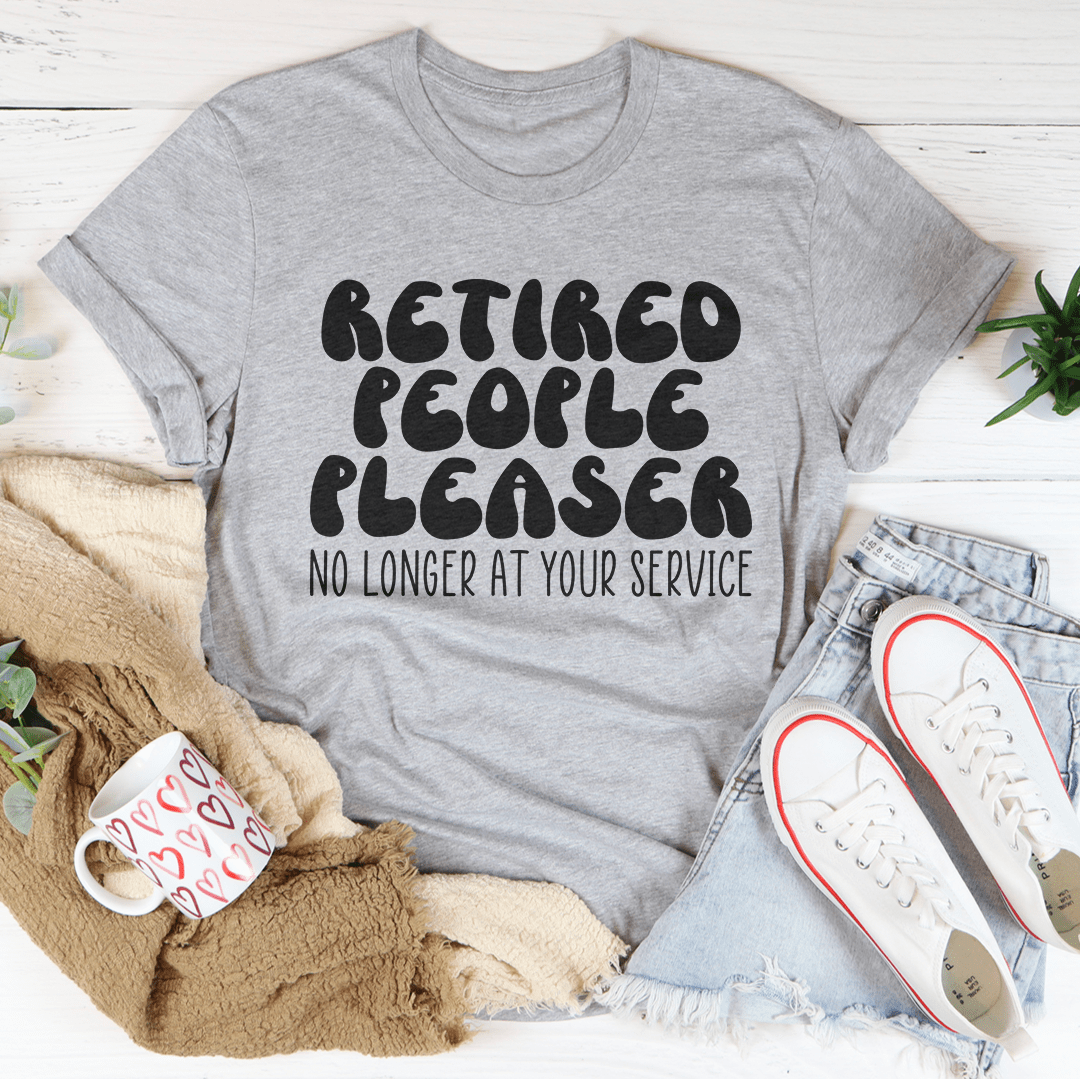 Gray slogan T-shirt: "Retired People Pleaser" with "No longer at your service"