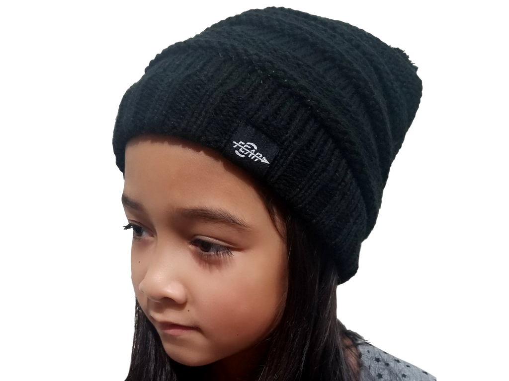Black ribbed knit beanie hat on child, side view