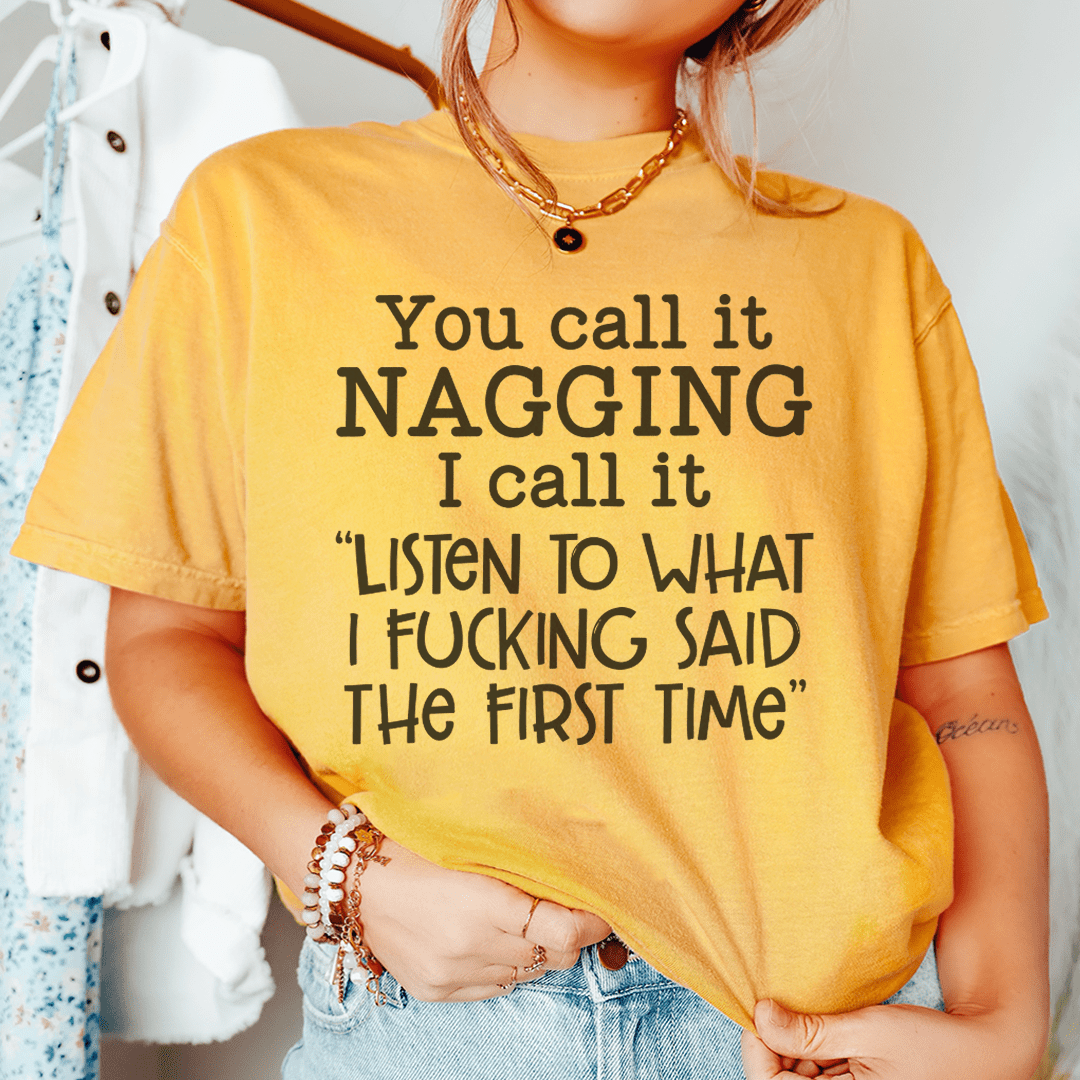 Mustard graphic crew-neck T-shirt featuring “NAGGING” slogan and quote