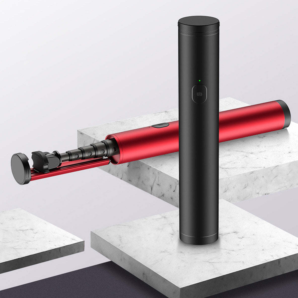 Black mini selfie stick with red extendable arm and phone mount, angled across steps.