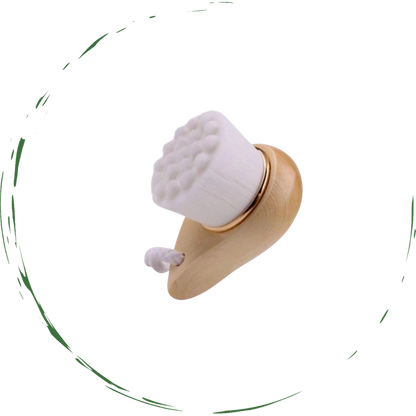 Facial brush with bamboo handle and soft white bristle head.