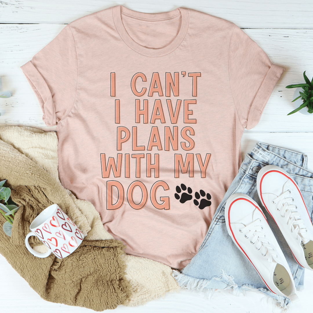 Mauve crewneck T-shirt with large 'I can't have plans with my dog' text and paw print