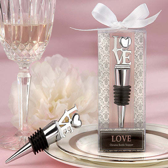 Chrome wine bottle stopper with black rubber grip, LOVE-themed gift packaging