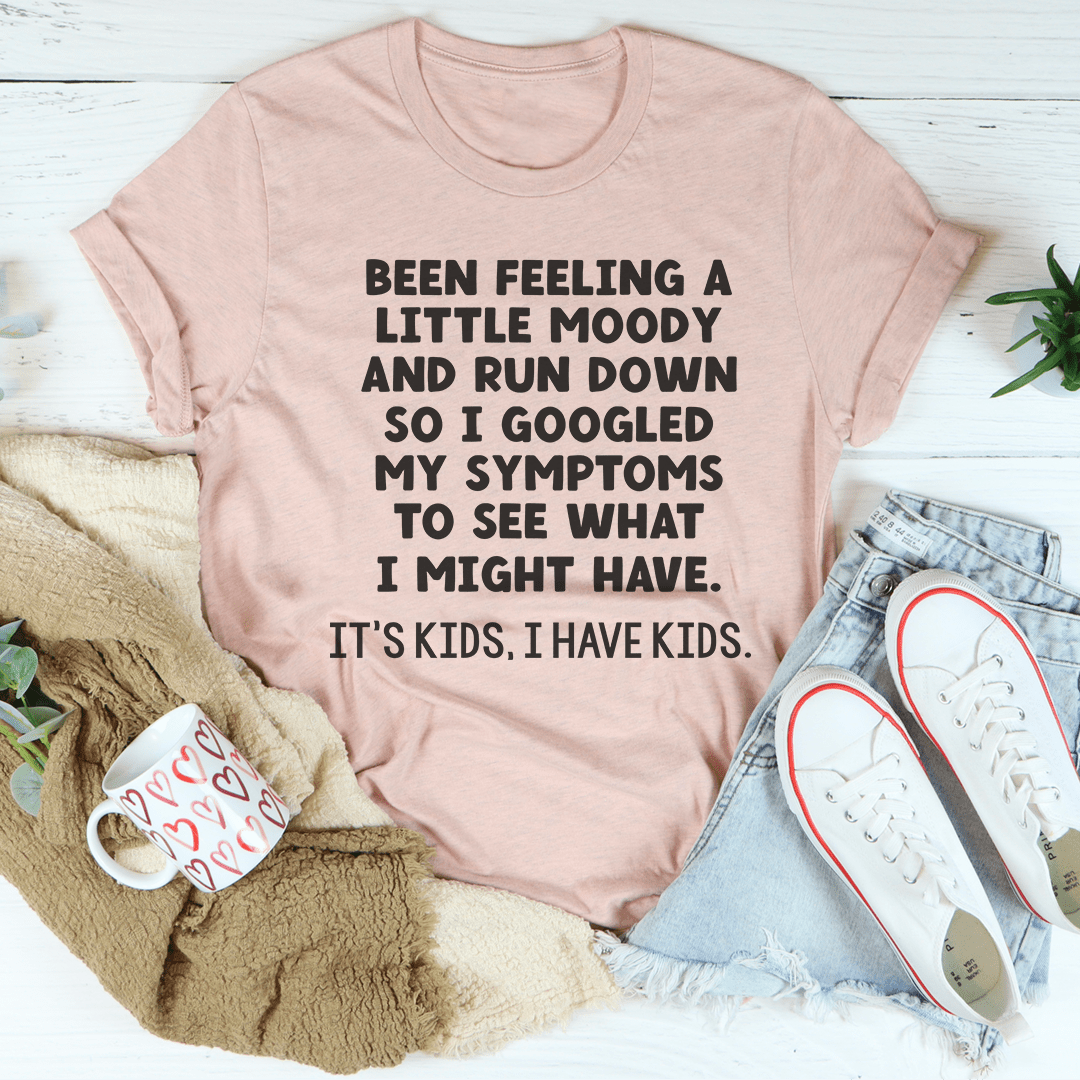 Mauve crew-neck T-shirt with black slogan text: 'Been feeling a little moody...'