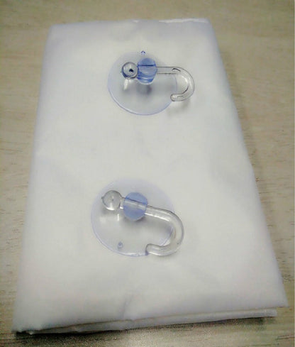 White waterproof grooming cloth with two mirror suction cups