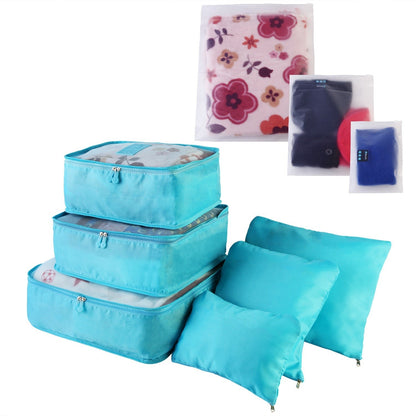 Light blue packing cubes set with zip closures and padded sides