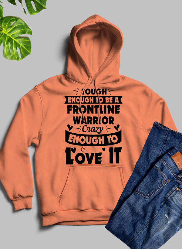 Burnt orange hoodie with front slogan graphic and kangaroo pocket, pullover hood