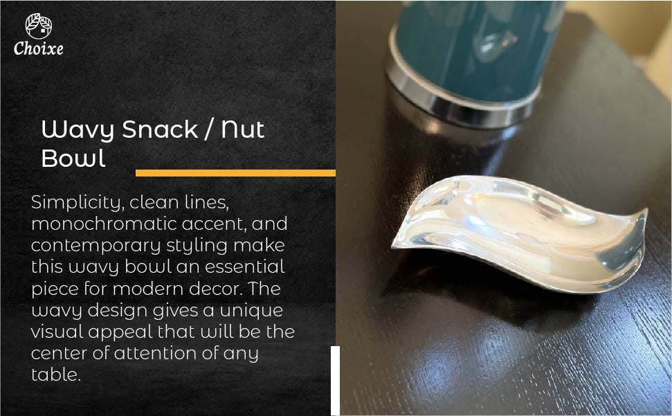 Wavy snack nut bowl, reflective silver aluminum dish on countertop
