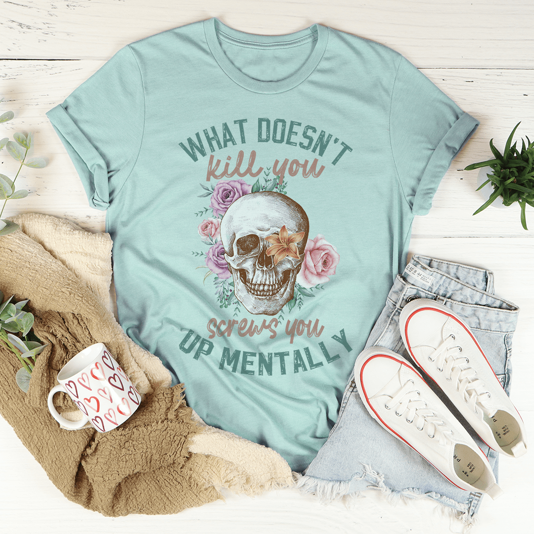 Teal T-shirt with skull and rose floral graphic and green slogan text