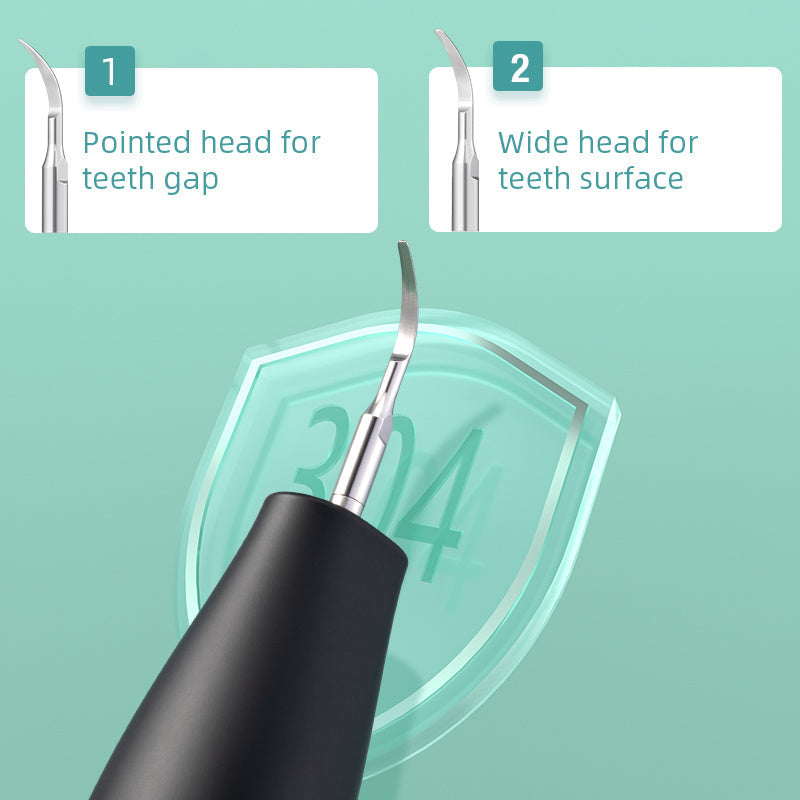 Black electric dental plaque remover with pointed head and wide head for teeth