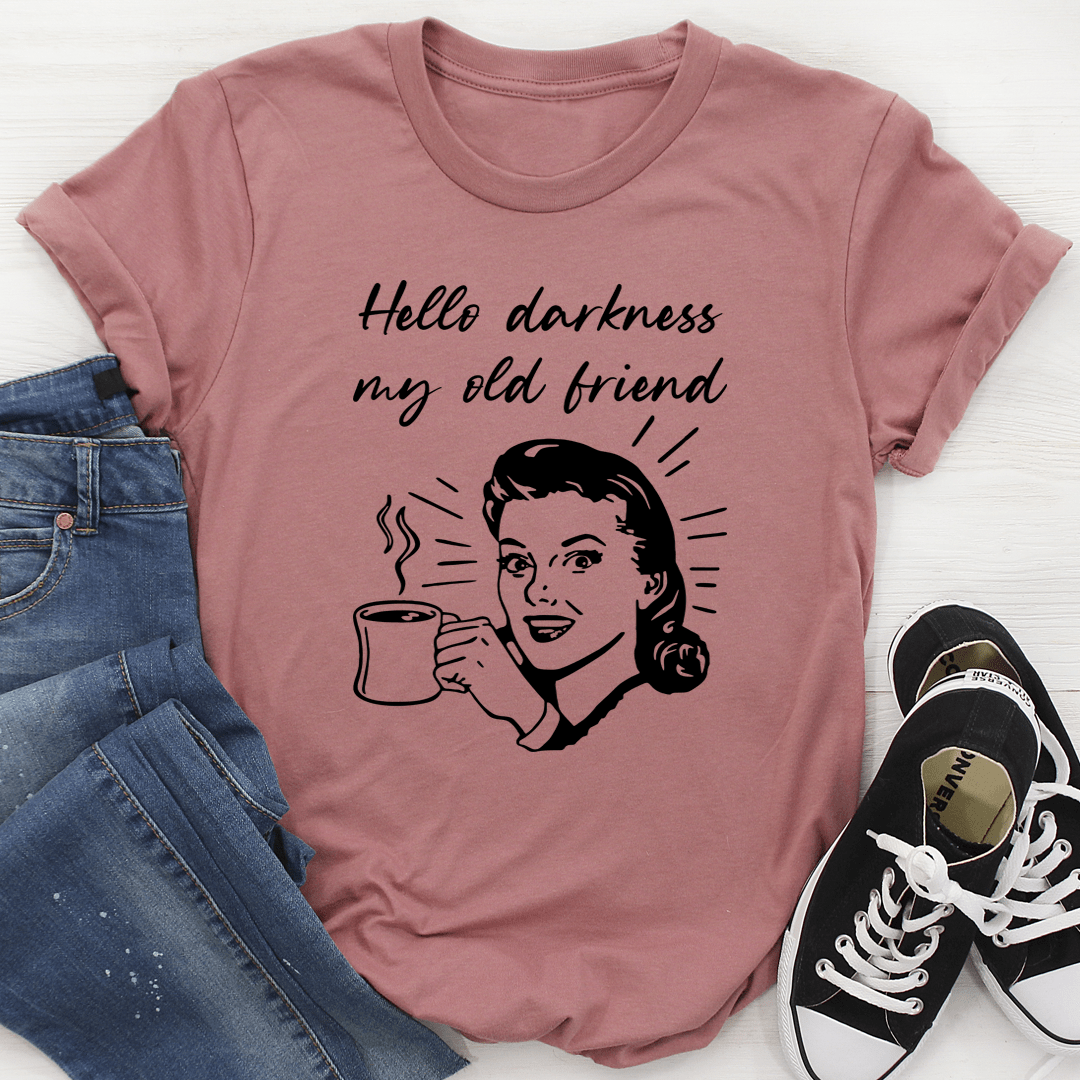 Mauve graphic coffee T-shirt with woman face, cursive text, and steaming mug design
