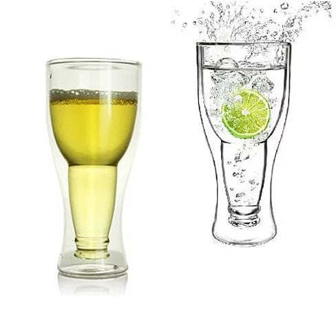 Novelty beer bottle glasses, one with yellow beer and one with lime slice in fizz