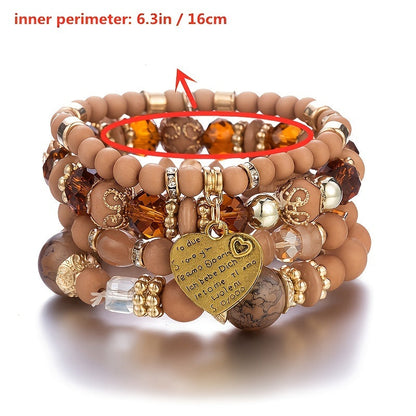 Layered beaded bracelet set with tan and brown beads and heart-shaped center charm