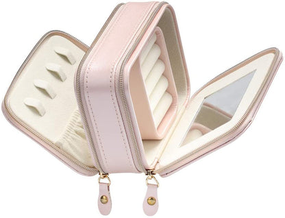 Pink jewelry storage case with double zippers, built-in mirror, and ring slots inside
