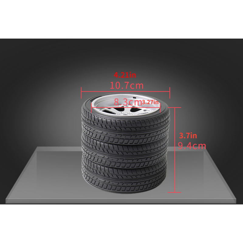 Black tire tread pen holder with red size measurement diagram