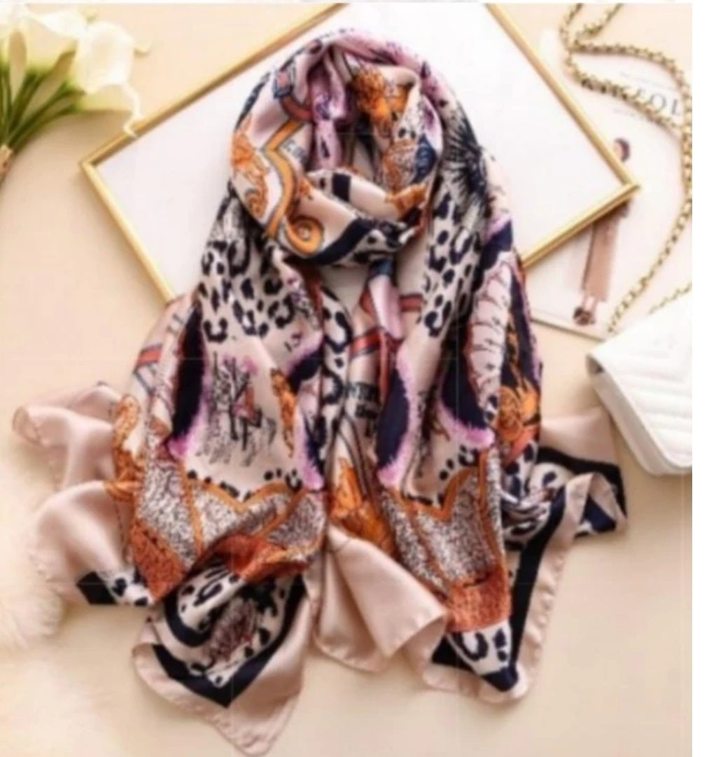 El StCyr luxury leopard print silky scarf in pink and orange with soft fringe edges