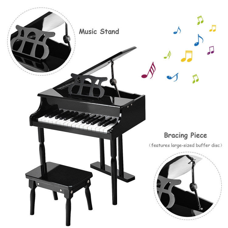 Black kids toy piano keyboard with music stand and bench, full setup view