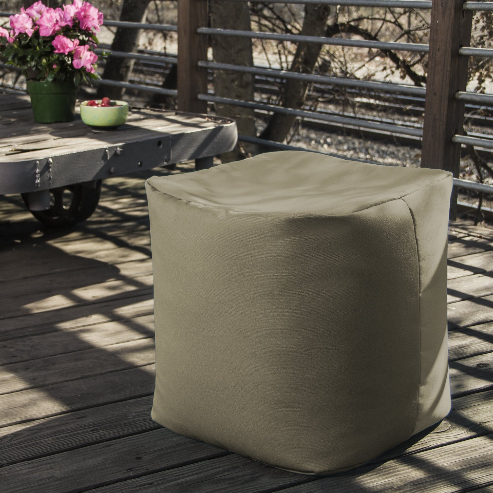 Taupe outdoor bean bag ottoman with square padded seat and stitched side panels