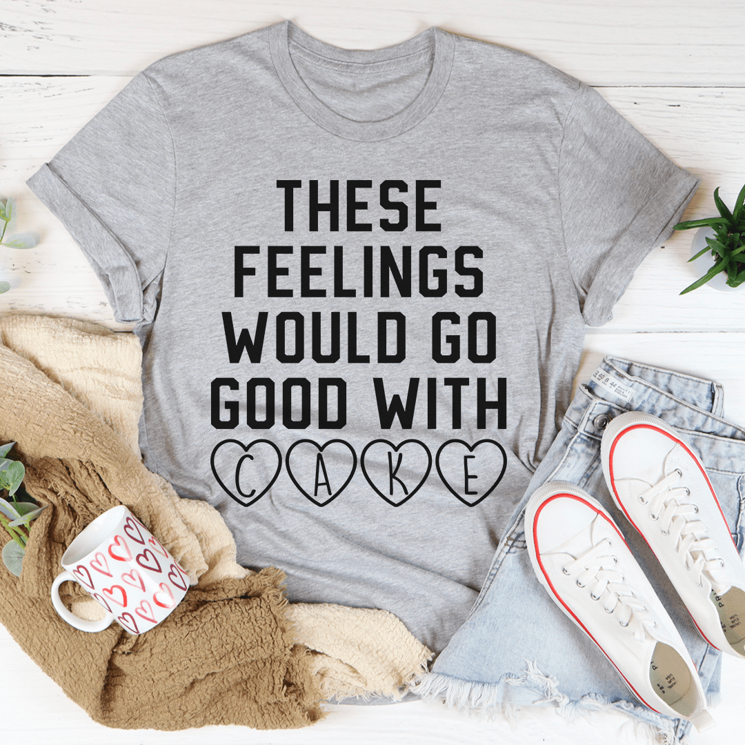 Gray crew-neck T-shirt with 'THESE FEELINGS WOULD GO GOOD WITH CAKE' lettering