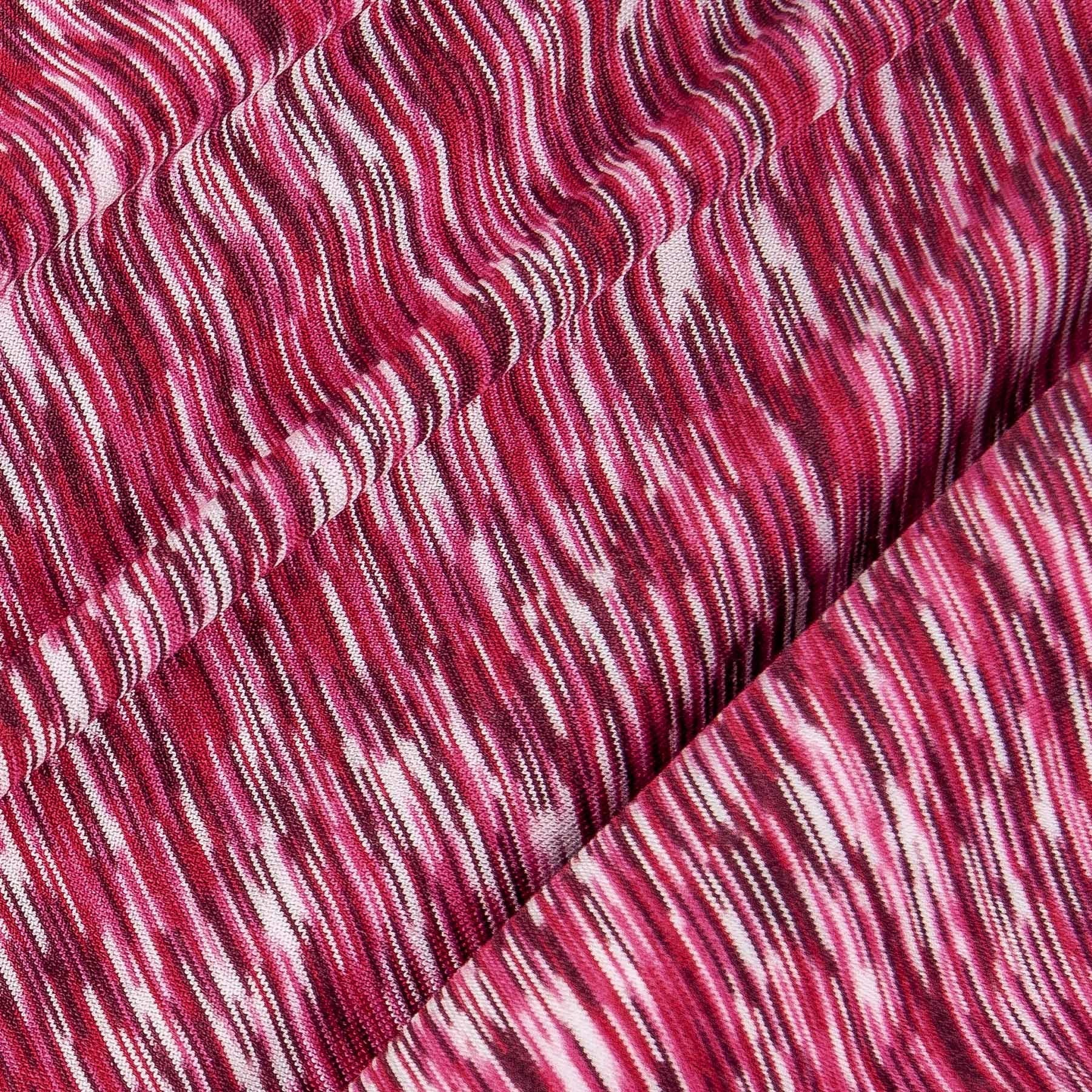 Heathered magenta-and-white performance knit fabric swatch