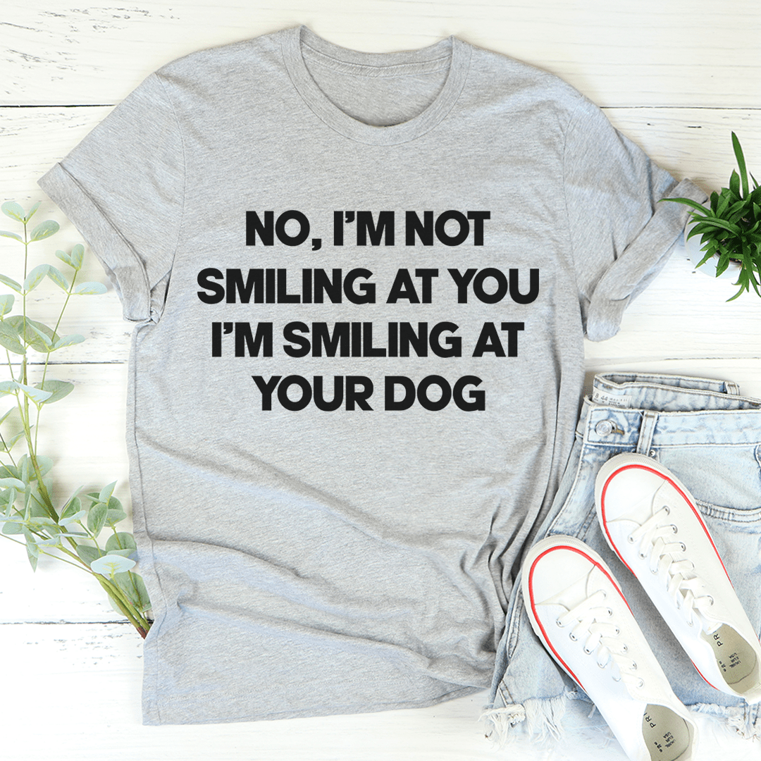 Heather gray short-sleeve T-shirt with bold black text: No, I'm not smiling at your dog