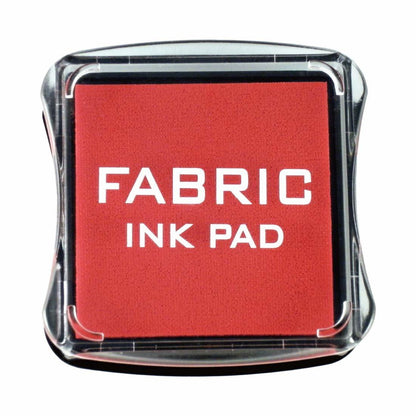 Red fabric ink pad in clear square case, with FABRIC INK PAD label