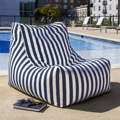Outdoor bean bag chair with navy-and-white striped upholstery, wide armrests