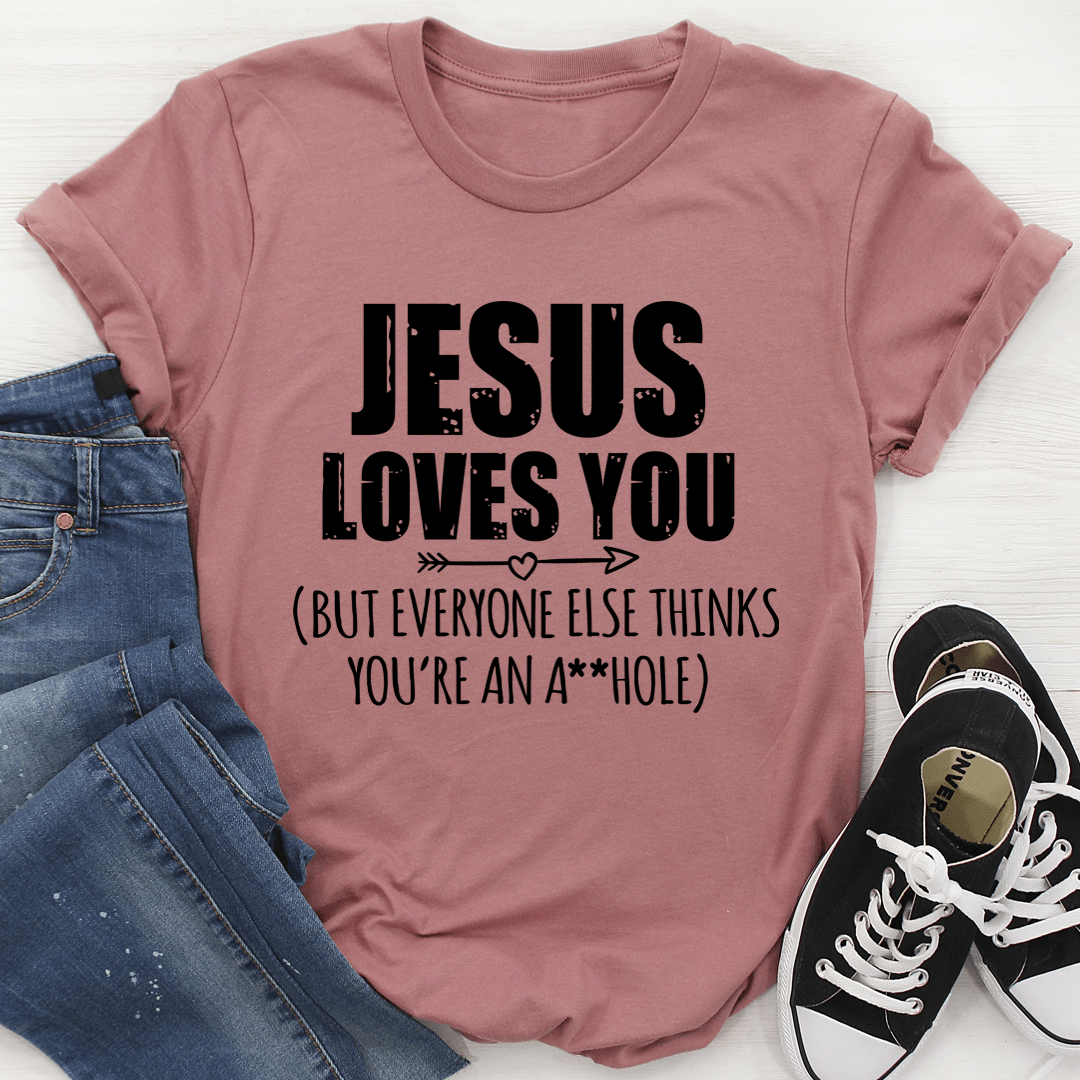Mauve crewneck T-shirt with black 'JESUS LOVES YOU' front graphic and slogan text.