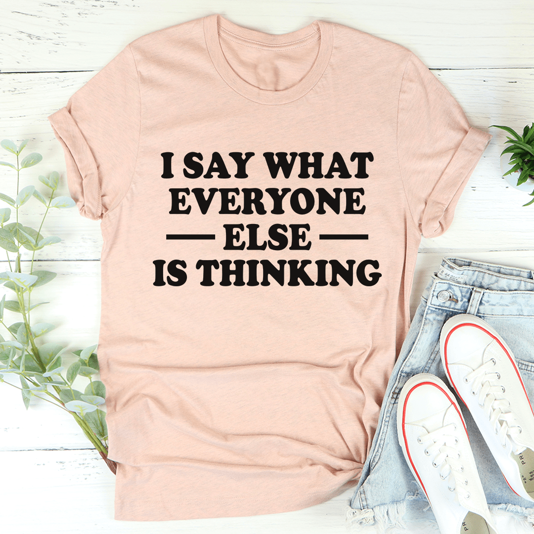 Peach T-shirt with bold slogan text: “I SAY WHAT EVERYONE ELSE IS THINKING”