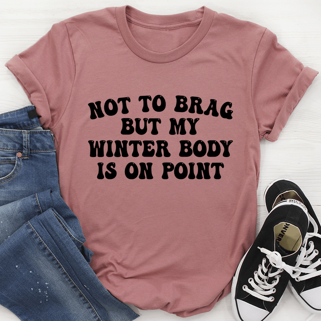 Mauve crewneck T-shirt with bold slogan graphic on the front