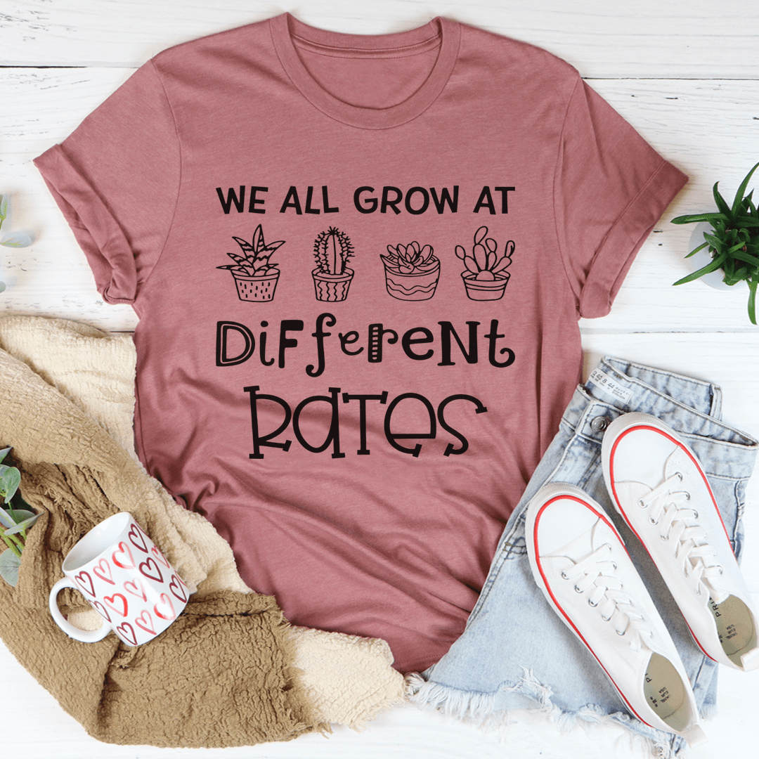 Mauve rose graphic T-shirt with cactus icons and "Different Rates" lettering