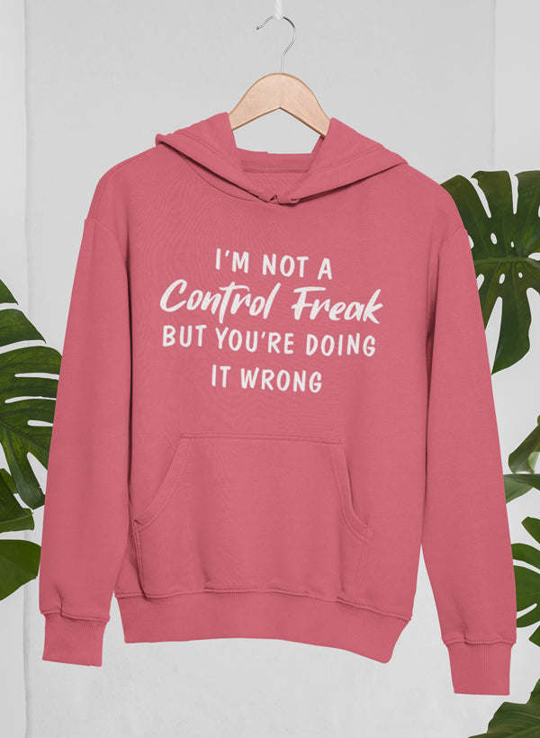 Pink hoodie with hood and kangaroo pocket; white slogan graphic on front
