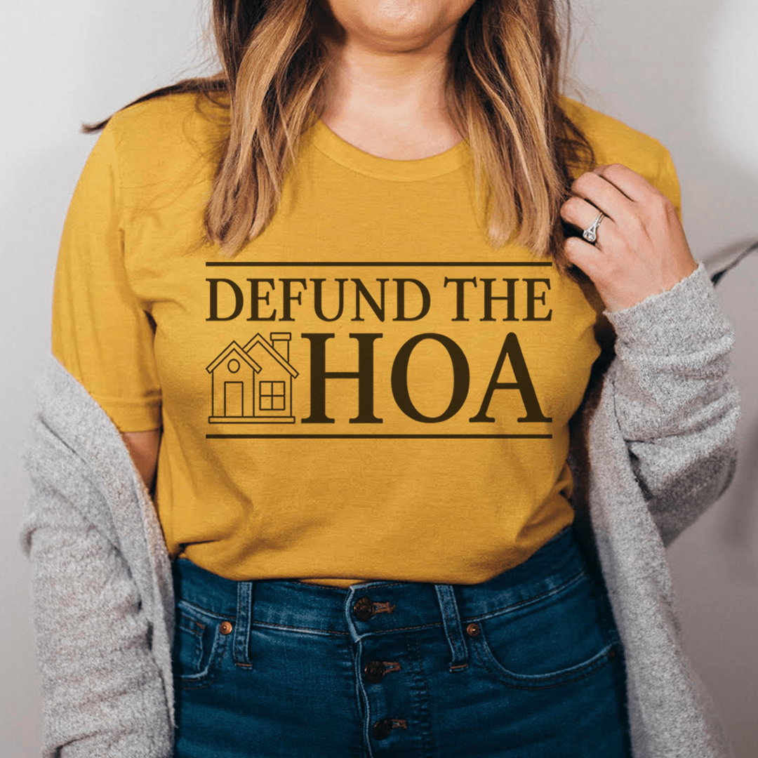 Mustard graphic T-shirt with “Defund the HOA” text and house icon