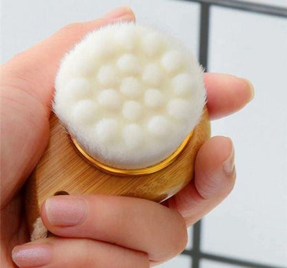 Round exfoliating scrub pad with white bristles in a wooden holder