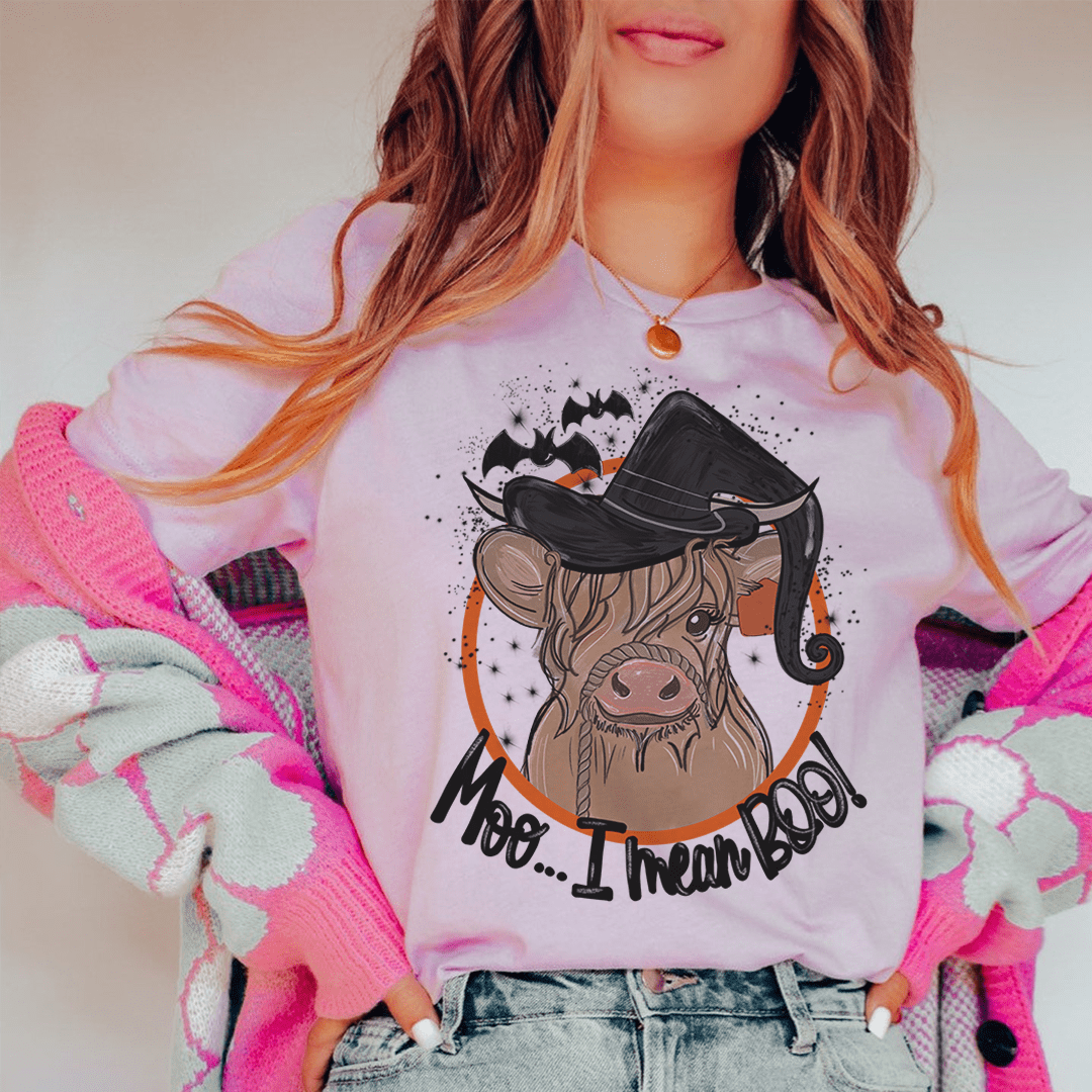Pink cow T-shirt with black hat graphic and 'Moo... I Dream Boo' lettering