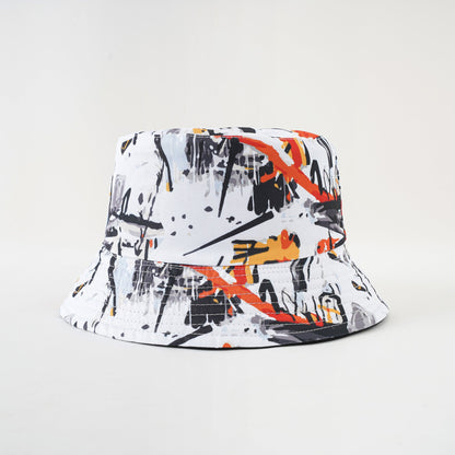 White bucket hat with graffiti artwork and orange accents, wide brim