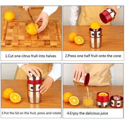 Manual citrus juicer in use, red lid pressing orange halves into stainless cup