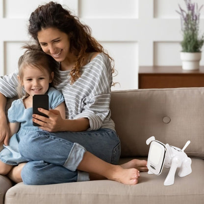 White puppy-shaped wireless speaker on sofa near a child holding a smartphone