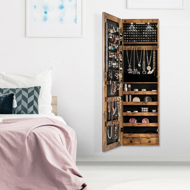 Mirrored jewelry cabinet with lights, open door showing necklace hooks and organizer shelves