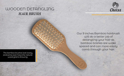 Bamboo detangling hair brush with light wood handle and white pin bristles