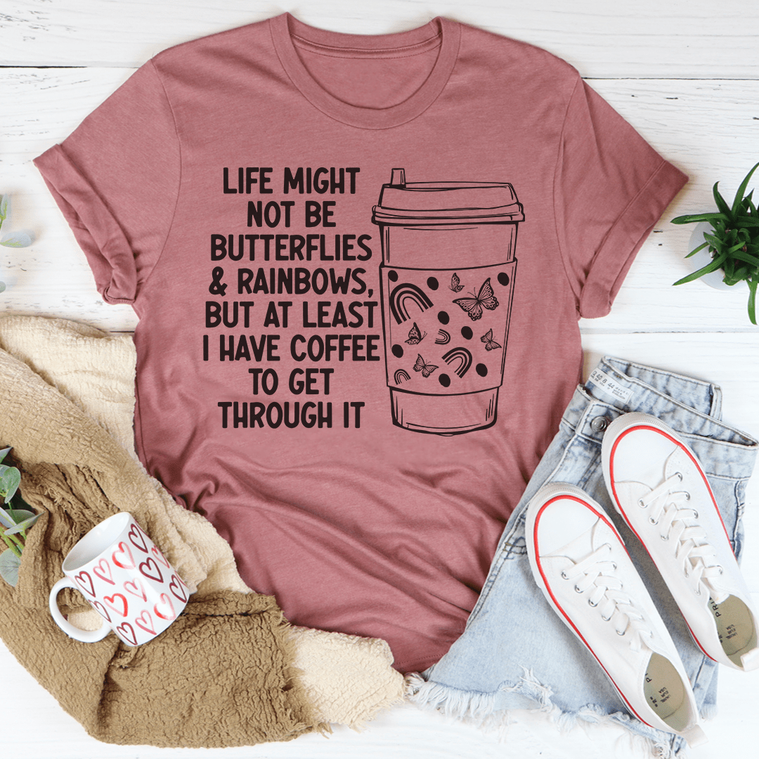 Mauve crew-neck T-shirt featuring coffee cup illustration with butterflies and rainbow accents
