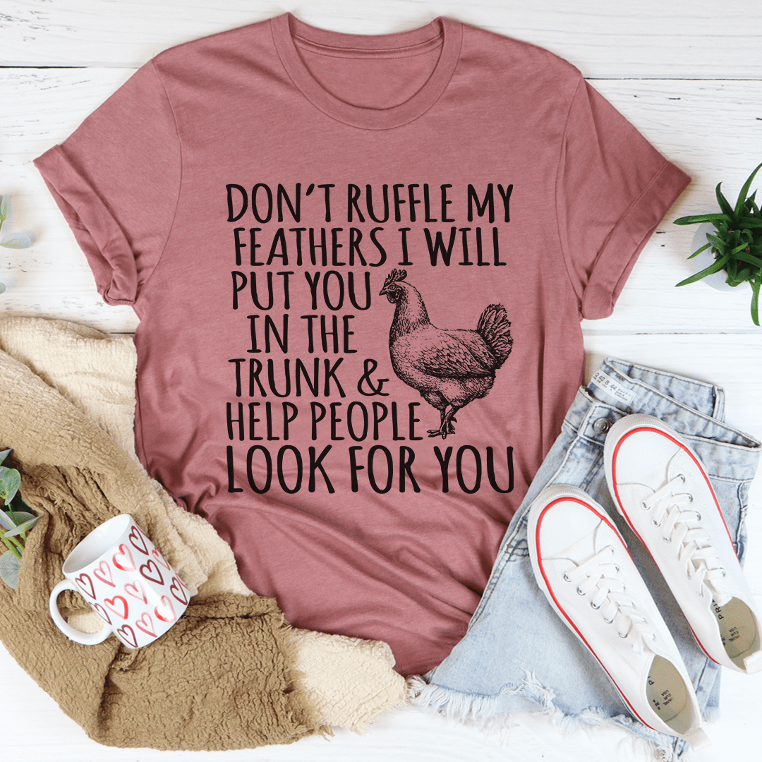Mauve graphic t-shirt with rooster and quote text on front