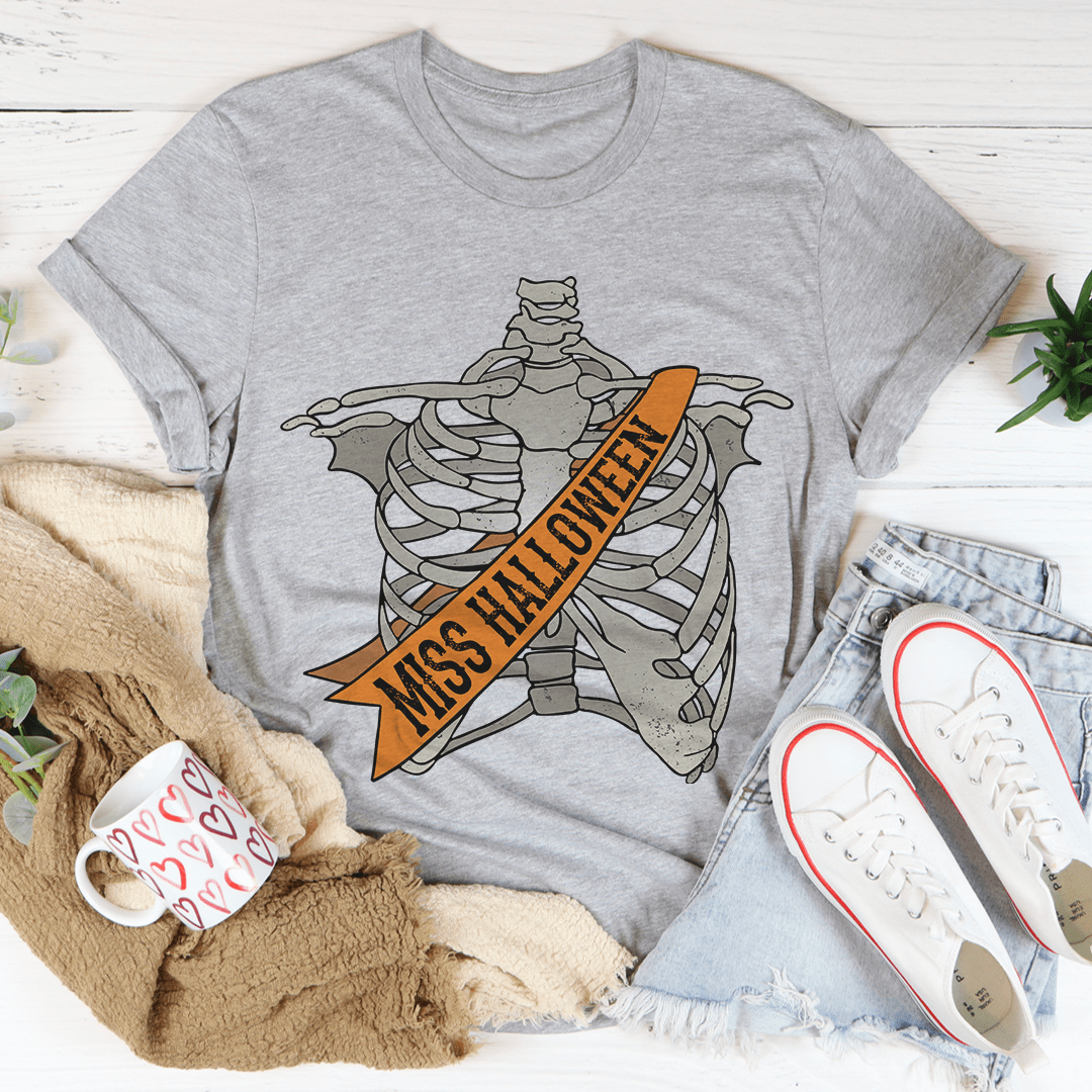 Gray crew-neck T-shirt with skeleton-and-ribbon 'Miss Halloween' front graphic.