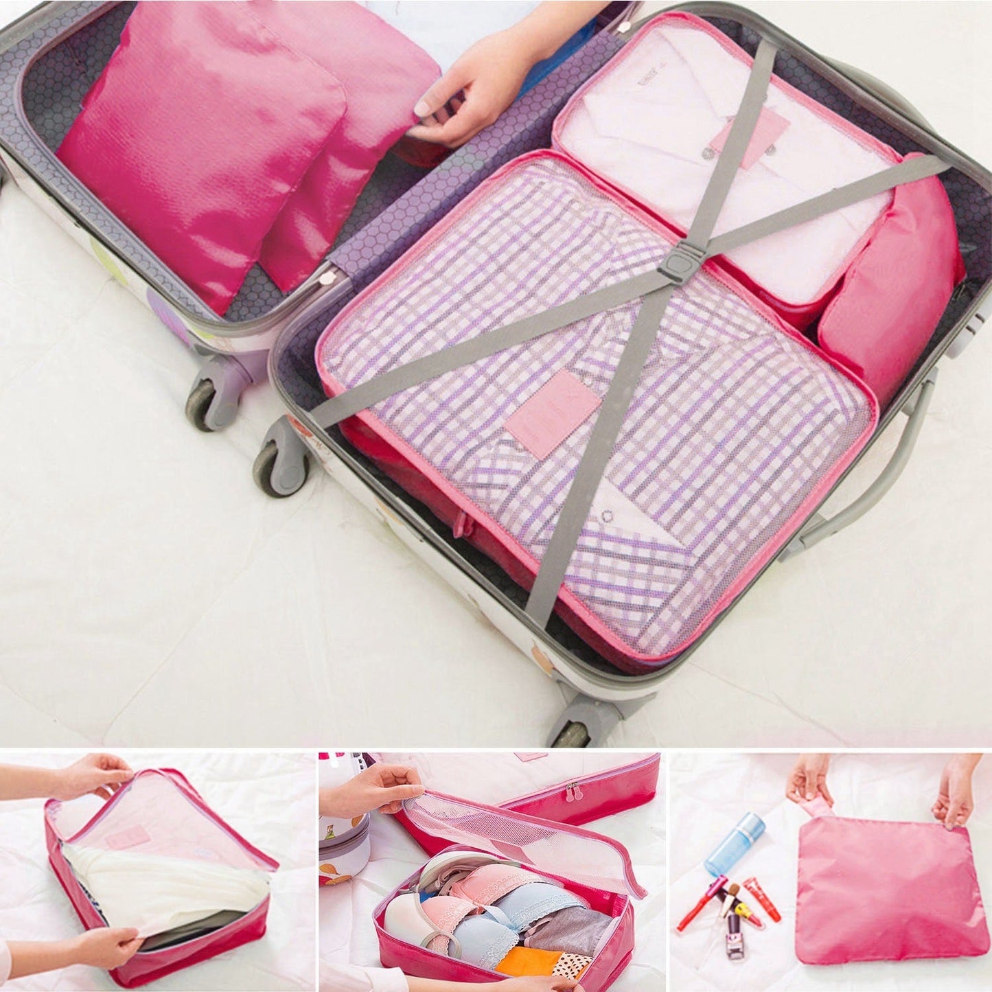 Pink packing cubes with gray straps and mesh panels inside a suitcase