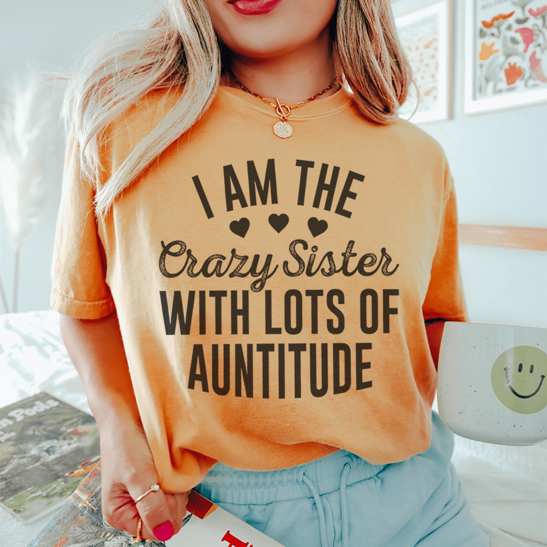 Orange T-shirt with “I AM THE Crazy Sister WITH LOTS OF AUNTITUDE” print