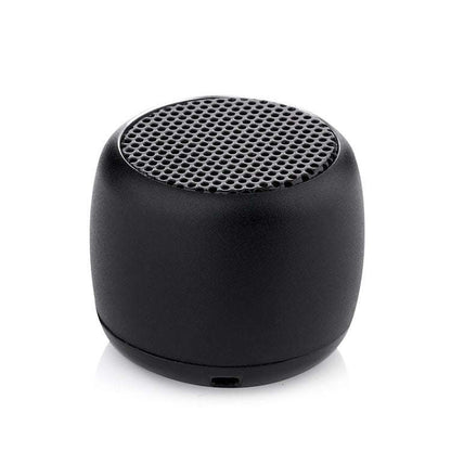 Black cylindrical mini Bluetooth speaker with top speaker grille and bottom port